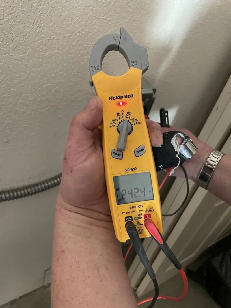 Voltage testing with clamp meter during Aluminum Wiring Replacement in University of California-Davis